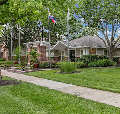 Sidewalk view of apartment building-Longfellow Heights Apartments, Kansas City, MO