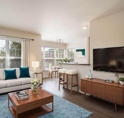 a living room with a couch and a tv