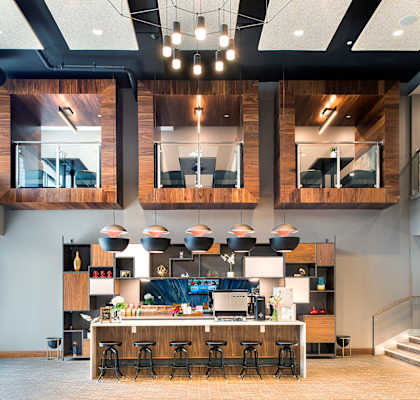 Fully Equipped Kitchen Includes Frost-Free Refrigerator, Electric Range, & Dishwasher In Clubhouse at Union Berkley Riverfront in Kansas City, MO