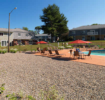 Pool with relaxing area at Rolling Green Apartments, Amherst, Massachusetts