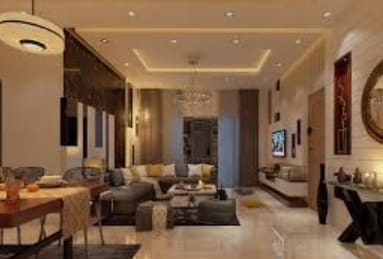 a living room filled with furniture and a chandelier