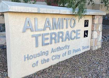 A sign for the Alamito Terrace Housing Authority of the City of El Paso, Texas.