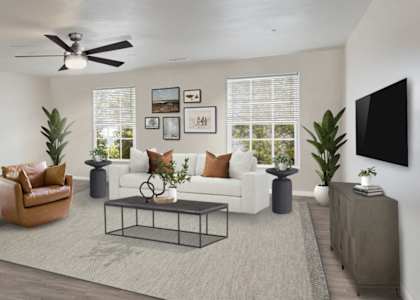 a living room with a white couch and a coffee table