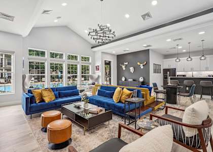 resident clubhouse with seating and kitchen