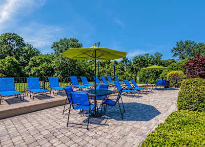 Pool Area Sundeck at Sabal Point Apartments in Pineville, NC