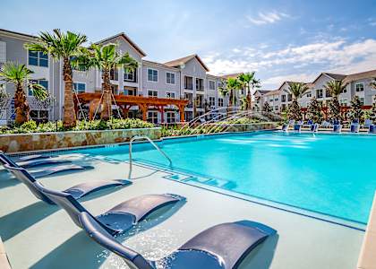 Poolside Relaxing Area at Stone Loch Apartments,Tomball, Texas