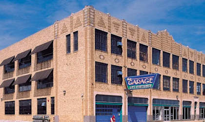 A large building with a sign that says Capage.