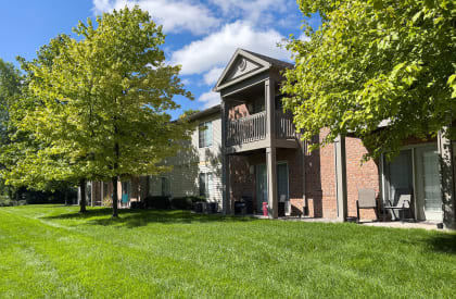 Exterior of Plaza at Lamberton Apartments in Grand Rapids, MI with Patio/ Balcony