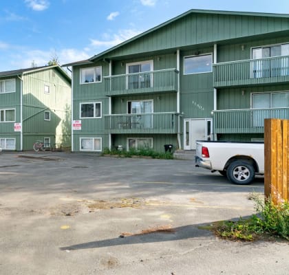 a parking lot in front of a building at ReNew Eagle River, Alaska, 99577