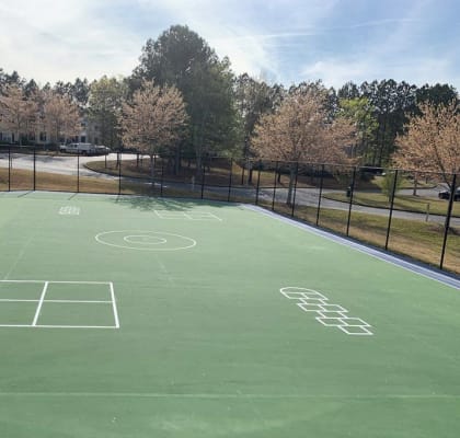 a tennis court with a soccer field on it
