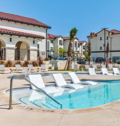 the swimming pool at the villas at grande chapel apartments in grand chapel springs