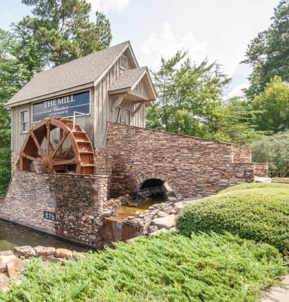 Mill with Water Wheel at The Mill at Chastain Apartments in Kennesaw, GA 30144