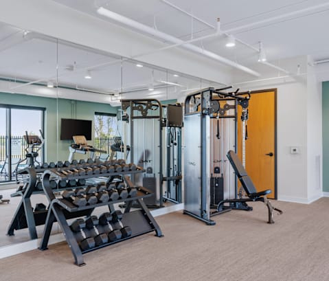 the collection 527 fitness room with cardio equipment