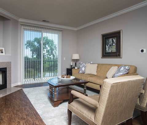 Living Room With Fireplace at The Sanctuary of Lake Villa, Lake Villa, Illinois
