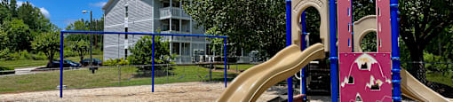 the playground at the whispering winds apartments in pearland, tx