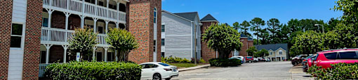a parking lot in front of a building