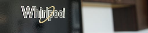 a refrigerator with the whirlpool logo on it