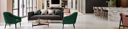 a living room with a couch and chairs and a table