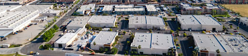 arial view of a city with mountains in the background at Loma Villas Apartments, California