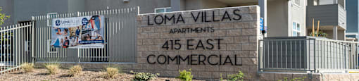 an image of the front of the loma villas apartments at Loma Villas Apartments, San Bernardino