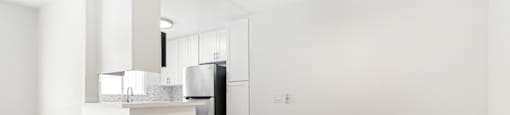 Open concept living and dining area with modern kitchen at Joro Properties Apartments, Hollywood