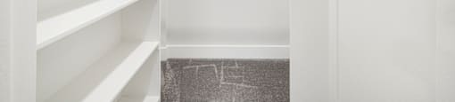 Walkin closet with shelving and hanging rods at Joro Properties Apartments, Hollywood, California