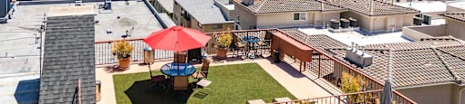 Rooftop deck with turf seating and panoramic city views at Joro Properties Apartments, Hollywood, CA 90046