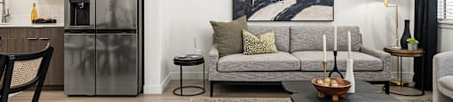 a living room with a couch and a table