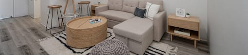 a living room with a couch and a coffee table