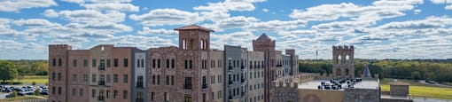 a view from the roof of a large building in a city