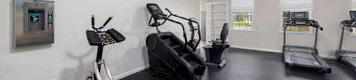 the fitness center with workout machines