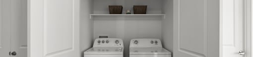 A laundry room with a washer and dryer.