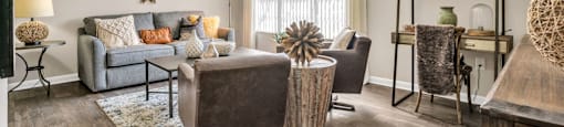 our apartments offer a living room  at Castilian Apartments, Orlando, FL, 32839