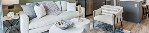 a living room with a couch and a table