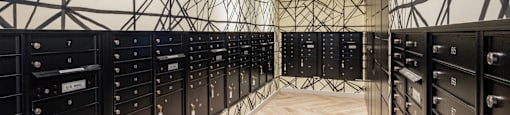 a room filled with lots of black and white lockers at Burano, Long Beach