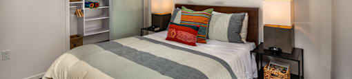 a bedroom with a bed and two night stands at Burano, Long Beach, CA 90802
