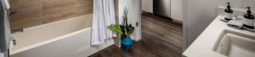 a bathroom with a bathtub and a sink at Burano, California, 90802