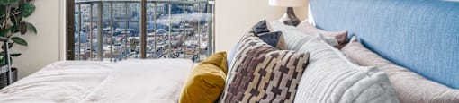Bedroom with window at Nob Hill Tower Apartments, California