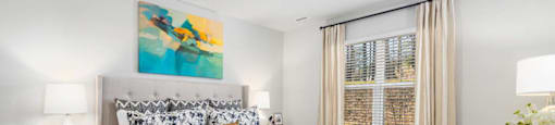 Bedroom with ceiling light at Ashford Townes Apartments, North Carolina, 27526