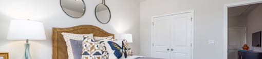 Bedroom with bed at Ashford Townes Apartments, North Carolina, 27526