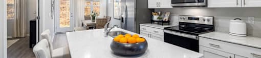 kitchen with appliances at Ashford Townes Apartments, Fuquay-Varina, 27526