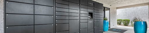 the garage of a home has a large wall of lockers