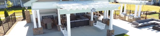 an overhead view of a pavilion with lounge furniture in an apartment complex