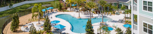 an aerial view of the pool at the resort at longboat key club