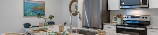 a kitchen with a granite counter top