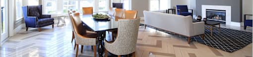 a dining room and living room with a table and chairs