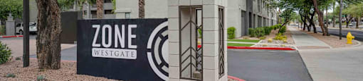 A sign for Zone Westgate is in front of a building with the number 6610.