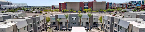 A parking lot with a building in the background.