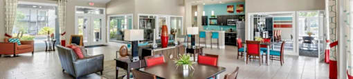 A spacious dining area with a table set for six.