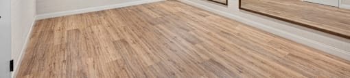 Yoga Studio with hardwood floors and mirrors